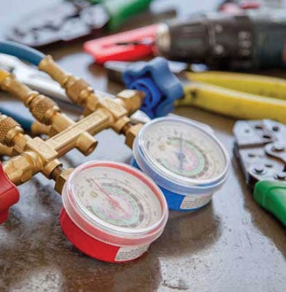 63125165 - technician is checking air conditioner