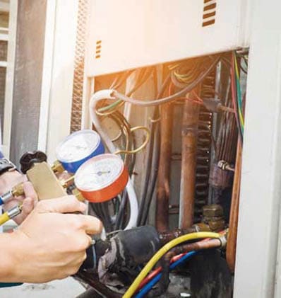 63125165 - technician is checking air conditioner