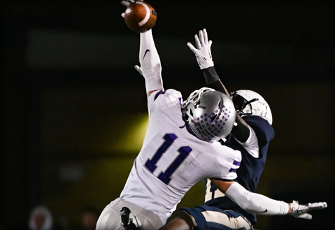 Bloomington South’s Miles McKay (11) breaks up a pass intended for Decatur Central’s N’Po Dodo (11) during the IHSAA 5A semi-state football game at Decatur Central on Friday, Nov. 17, 2023.