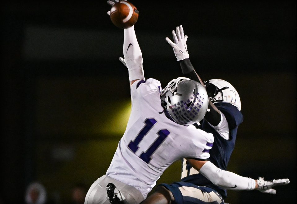 Bloomington South’s Miles McKay (11) breaks up a pass intended for Decatur Central’s N’Po Dodo (11) during the IHSAA 5A semi-state football game at Decatur Central on Friday, Nov. 17, 2023.