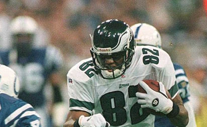 5 Dec 1996: Wide receiver Chris T. Jones #82 of the Philadelphia Eagles attempts to elude Ray McElroy #40 of the Indianapolis Colts in the first half at the RCA Dome in Indianapolis, Indianna. Mandatory Credit: Matthew Stockman/Allsport